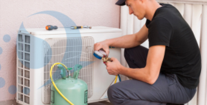 HVAC expert checking refrigerant