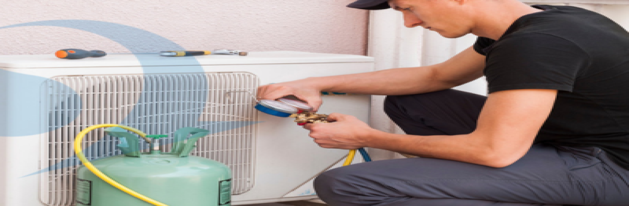 HVAC expert checking refrigerant